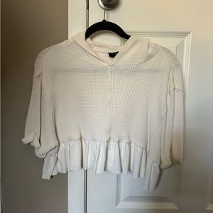 Out from under sweatshirt